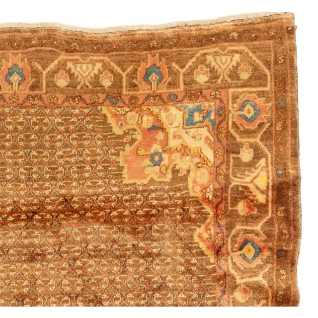 This is a lovely antique Persian Sarab gold camel hair rug from the 1920s and measures 5.2 x 9.10 ft. It is in excellent...