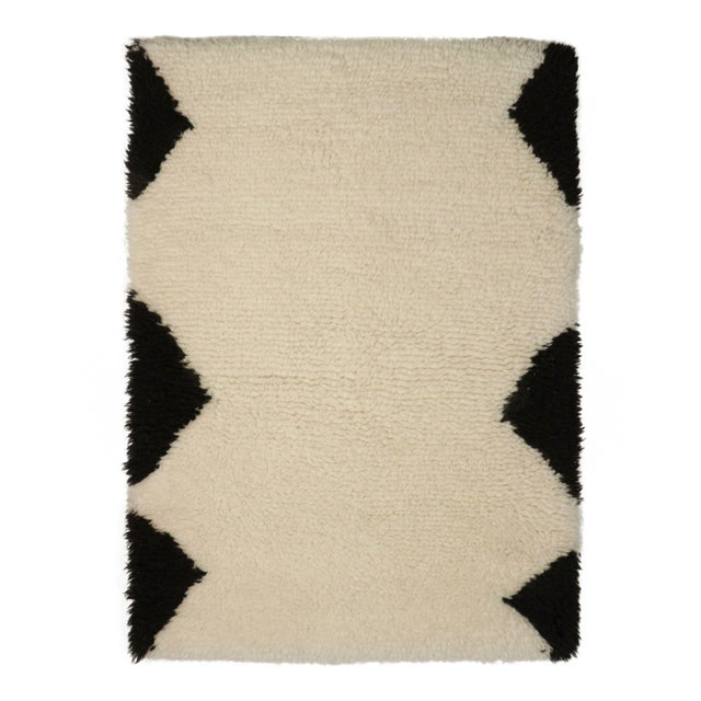 A refined 2x3 rug designed for versatile placement in intimate spaces. Ideal for entries, kitchens, baths, bedsides, and...