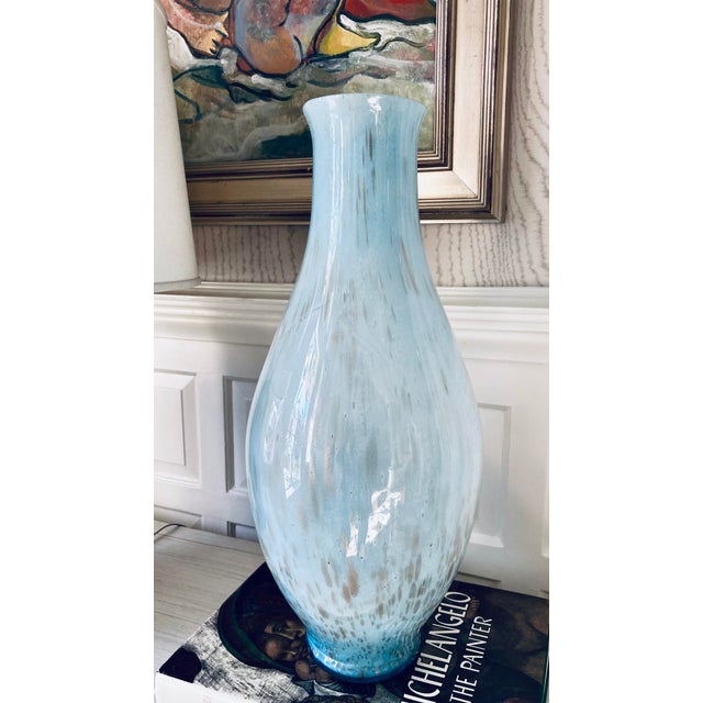 This vintage Italian Murano-style art glass vase was made in the 1970s–1980s. It features a graceful teardrop silhouette...