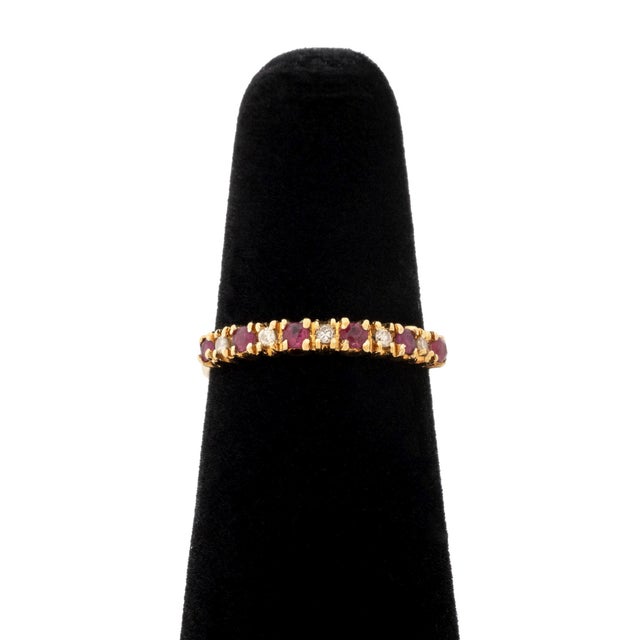 14K Yellow Gold Ruby Diamond Ring, featuring six prong set round brilliant cut rubies weighing a total of approx. 0.18...