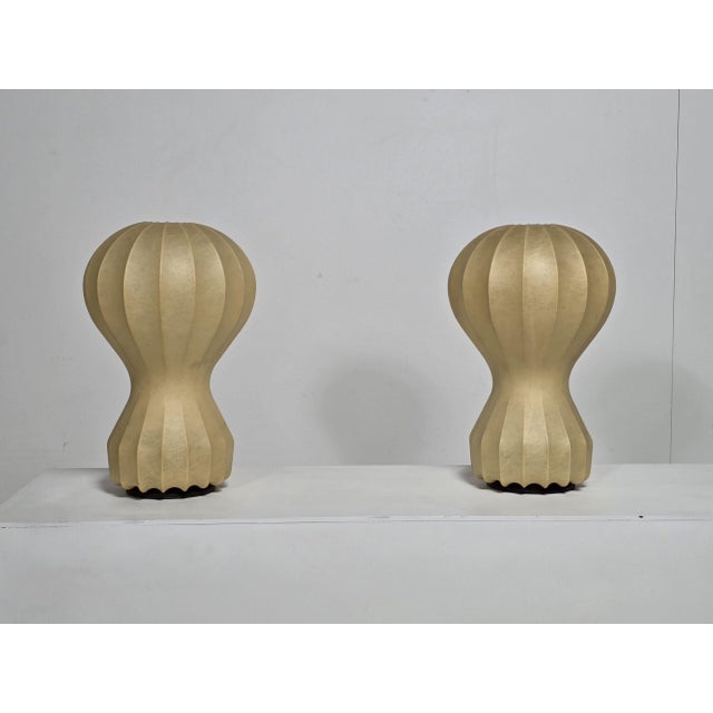 Pair of Gatto Piccolo table lamps designed by Achille and Pier Giacomo Castiglioni for Flos, 1960s. Created using the...