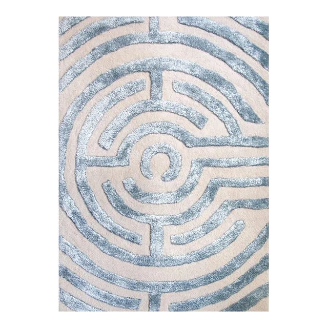 Walk the maze with the Lucca circular rug design, named after the carved labyrinth in the Cathedral of San Maritino in...