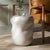 Give a contemporary update to your home with our stunning Carrick accent table. The solid body of the table is softened...