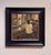 This oil on canvas painting captures a warm, intimate moment in a kitchen setting, where figures engage in quiet...