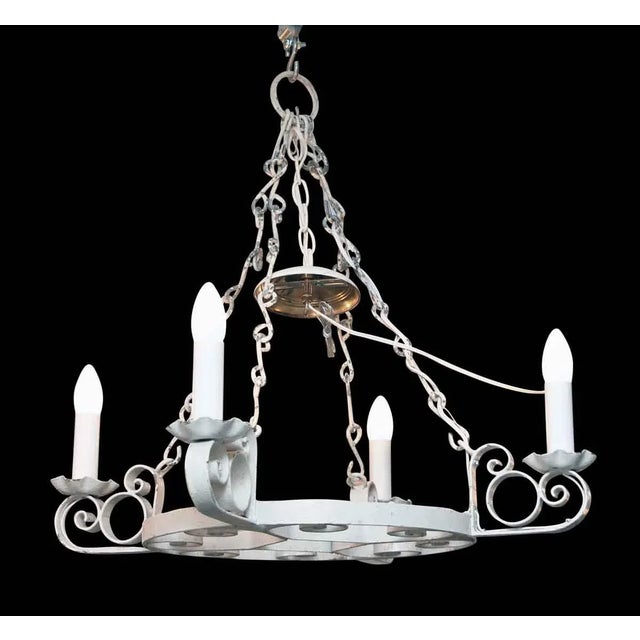 Arts & Crafts style white wrought iron chandelier. This needs rewiring. Rewiring is not included.