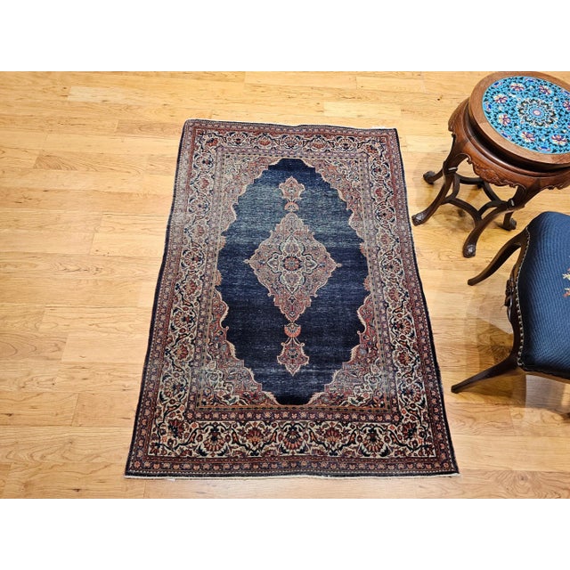3’ 4” x 4’ 10” Vintage hand knotted Persian Kashan area rug in medallion design in navy blue, ivory, red, and green from...