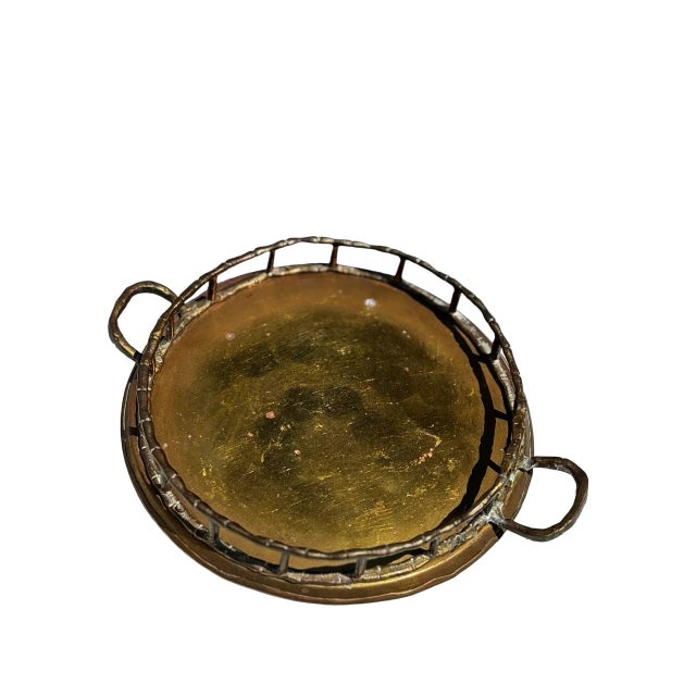 Small brass tray with a nautical vibe will add a depth of character to any room.