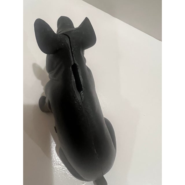 Vintage cast iron piggy bank from the good ol’days! A cute little addition to a table or desk for pig lovers. Excellent...