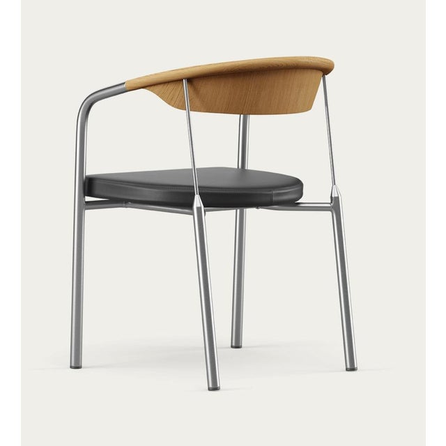 Henrik tengler chairman wood types: oak dark oil, upholstery: black for one collection the chairman was designed by henrik...