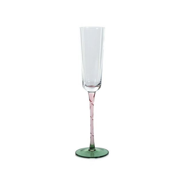 One of the festive and most fun ways to serve champagne is this set of champagne glasses. This unique swirled-stem flute...