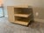 The “E” End Table by Kreiss provides three layers of space to accessorize or for storage, while its geometric wood design...
