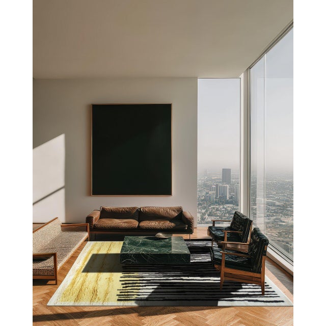 Mira Iris Yellow Hand Knotted Wool Rug, Country of Origin: India. This striking contemporary piece marries meticulous...