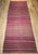 A beautiful vintage Moroccan Berber rug from the third quarter of the 20th century in a softly luminous stripe pattern —...