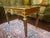 This is a gorgeous desk made by cabinet maker Donald Ross in England in the 19th century, in the style of French furniture...