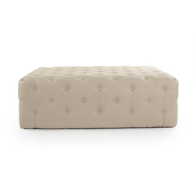 The Rectangular Tufted Ottoman from Zentique is an elongated ottoman with allover diamond button tufting in natural linen....