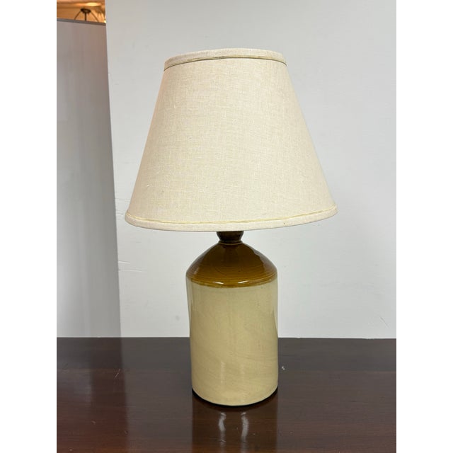 Design Plus Gallery presents a Ceramic Table Lamp from Pearsons Chesterfield. The ceramic body has a cylindrical form with...