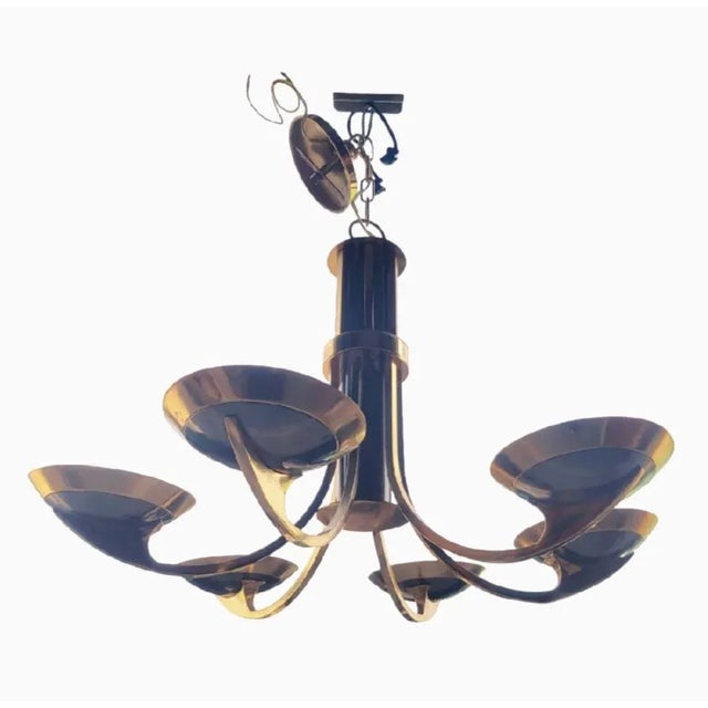 A wonderful vintage brass and smoky metal 6 light Mid Century modern chandelier. The chandelier features 6 Halogen lights...