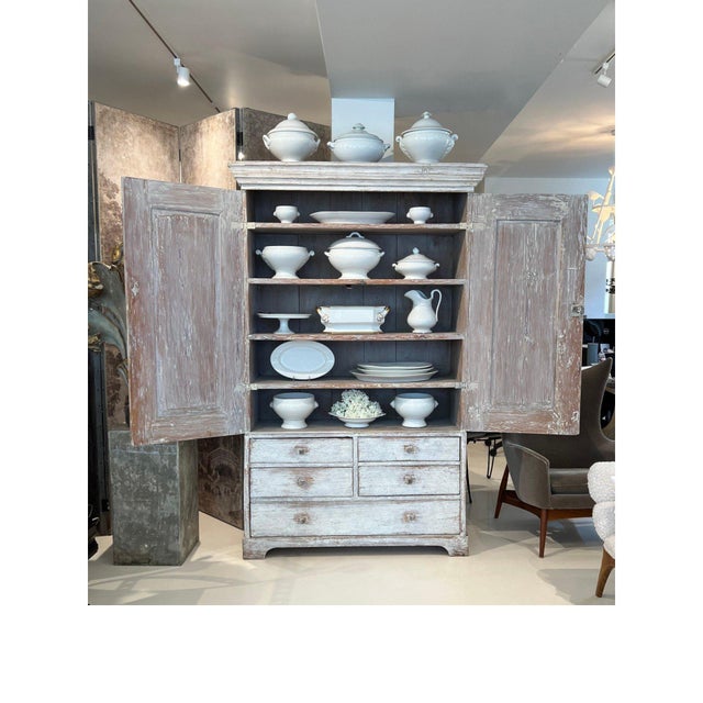 A beautiful example of Swedish Gustavian craftsmanship, this 18th-century cabinet features distinctive reeded diamond...