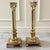 Elegant and substantial pair of neoclassical candlesticks designed in the form of Corinthian columns. Each stands an...