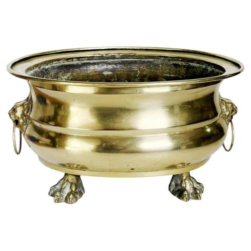 Brass champagne cooler/planter, France, 1950s, with an elegant and timeless design. Made of polished brass, this piece is...
