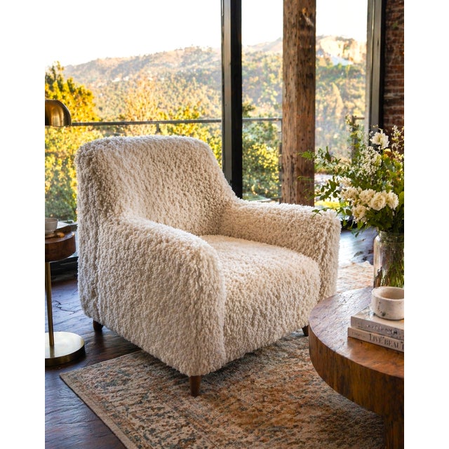 The Newman Sheepskin Lounge Chair is a great design for any interior concept. Produced from a solid wood frame and...