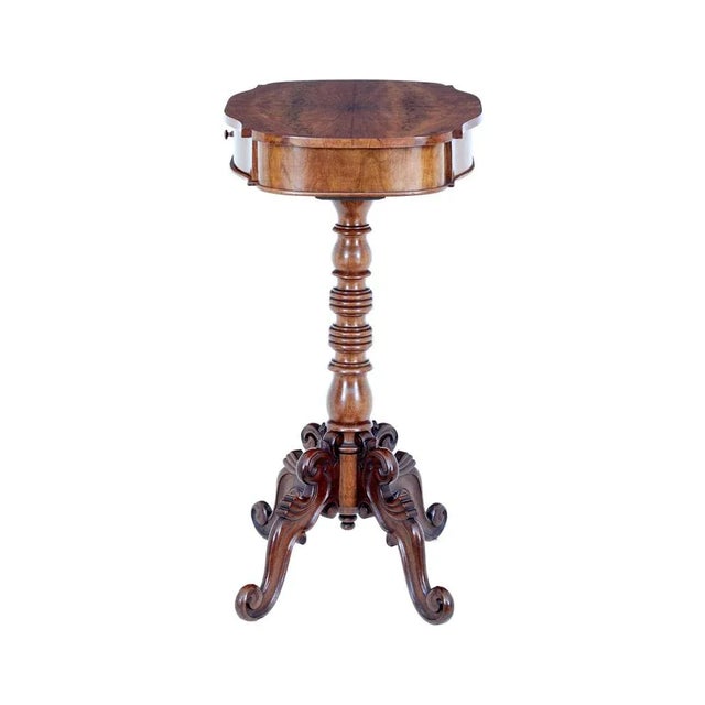 19th Century carved flame mahogany side table circa 1890. Fine quality shaped top surface with matched flame mahogany...
