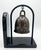 Vintage bronze elephant bells bookend with cast relief designs of working elephants on the bell surfaces and mounted on...