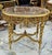 Make a dramatic statement with this French Louis XVI style coffee table, featuring an exceptionally ornate design, a...