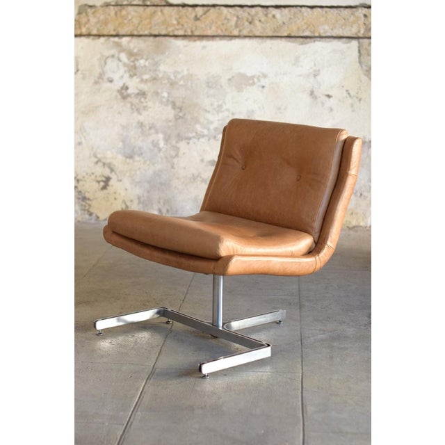 Discover this magnificent leather and steel armchair from Raphael Raffel, Apelbaum edition 1973. Design dating from the...