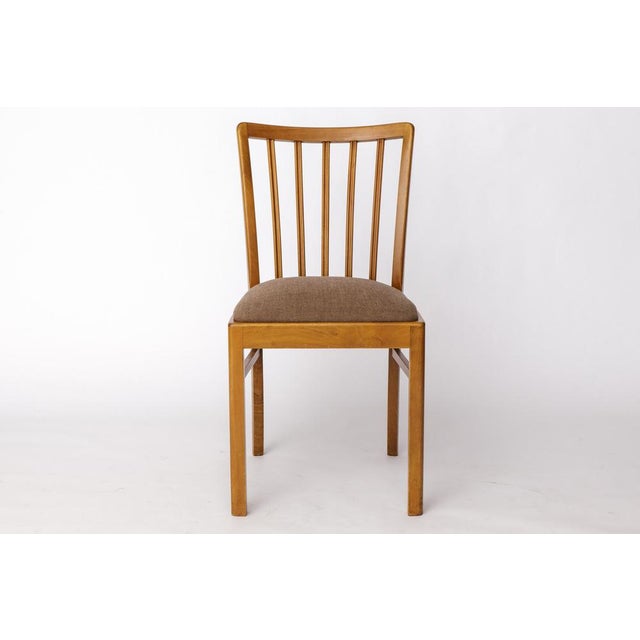 Vintage Chair from the 1950s–1960s Manufacturer: Stöss, Germany Sturdy solid beech wood frames. Newly reupholstered with...