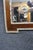 Antique Federal style wall mirror crafted in mahogany with silver gilt trim and decorative neoclassical ornamentation. The...