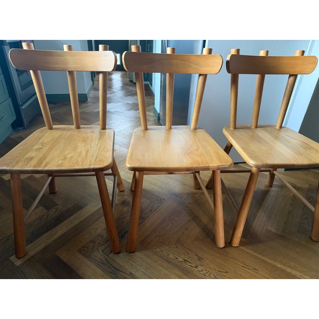 A fresh take on a classic spindle-back silhouette, the Mya Oak Dining Chair is inspired by the minimalist aesthetic of...