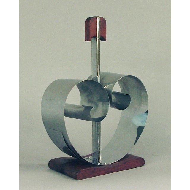 Offering a downright sculptural Art Deco "magazine rack" for the discerning homeowner or collector. It's guaranteed to...