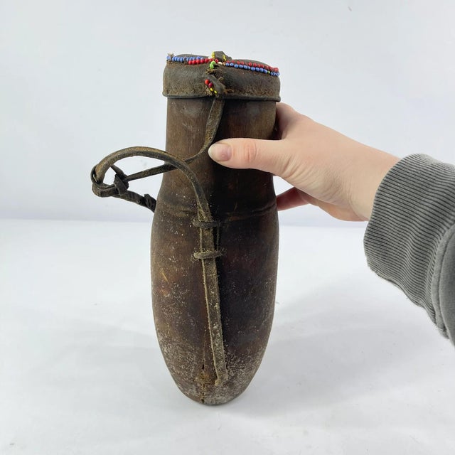 Early 20th Century Pokot Wood Milk Container with Lid and Strap Kenya MATTER COLLECTION For Sale - Image 9 of 9