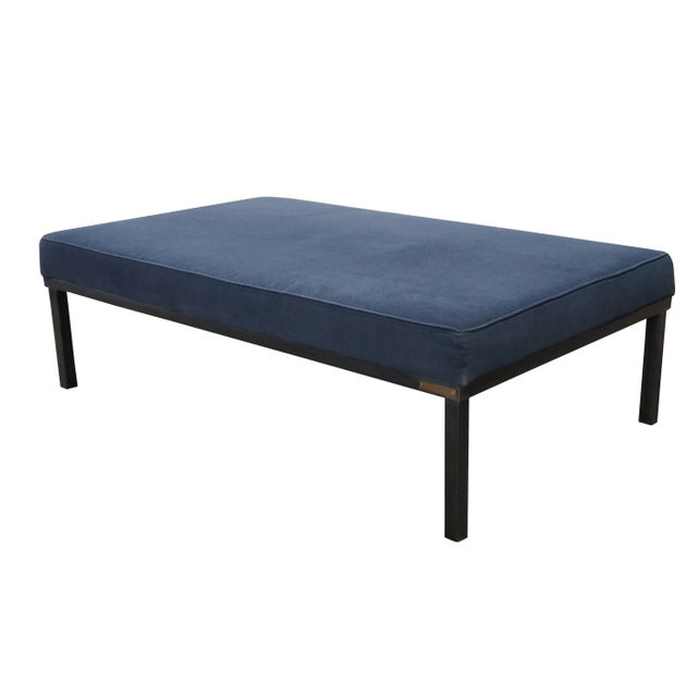 Rare vintage modern cocktail ottoman / footstool / footrest featuring rectangular form with blue upholstery and steel...