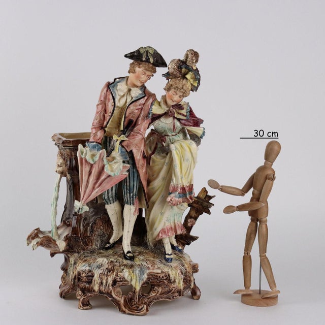 Large ceramic sculpture in art nouveau style depicting a gallant couple walking. Very realistic and accurate plasticity of...