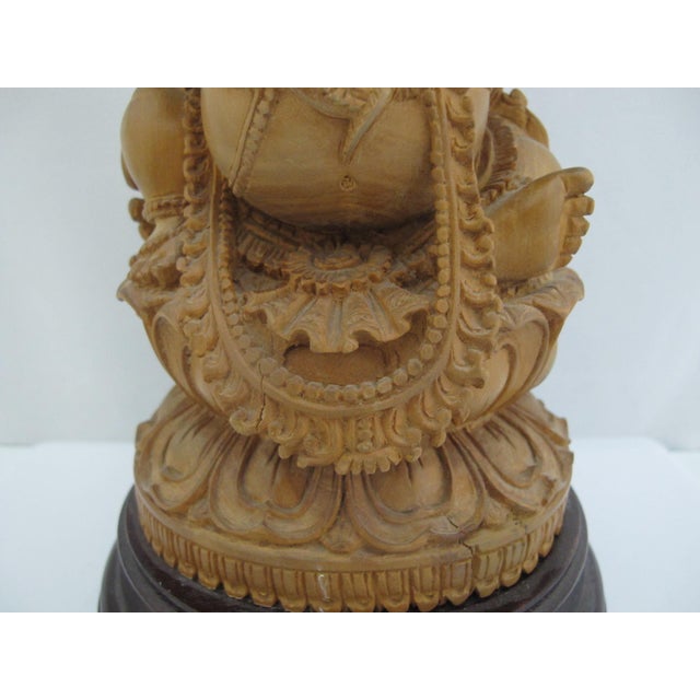 Seated Lord Ganesha Holding Fruit Carved Wood Hindu Deity God Statue on Pedestal For Sale - Image 11 of 13