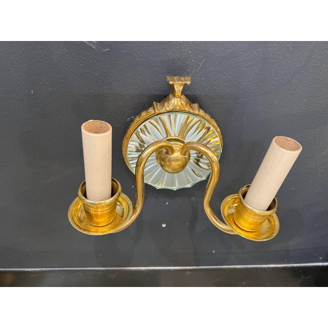 pair of circa 1920's Caldwell gilt bronze double lights sconces with mirrored back plated