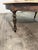 Wood Large Rustic Round Pine Dining Table With Ebonized Turned Legs For Sale - Image 7 of 7