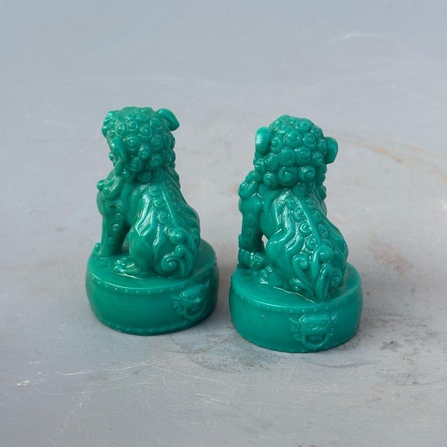 This matching set features a male and female lion, intricately detailed with traditional curly manes, bulging eyes, and...