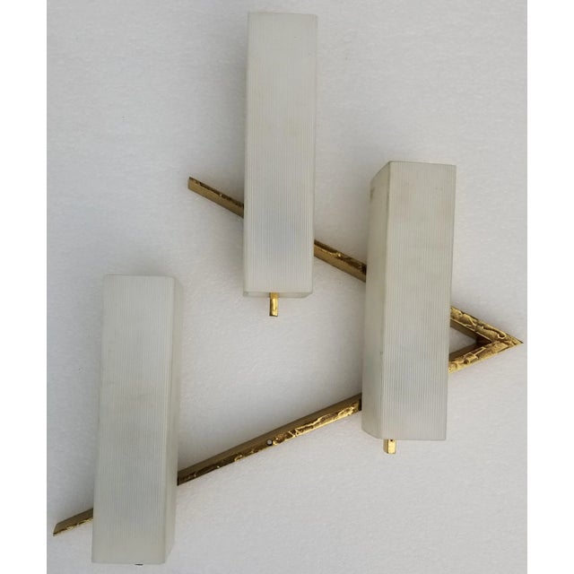 Pair Of Maison Arlus Bronze Sconces, Hammered Dore Bonze , 3 original rectangular opaline shades. US rewired, 40 watts max...