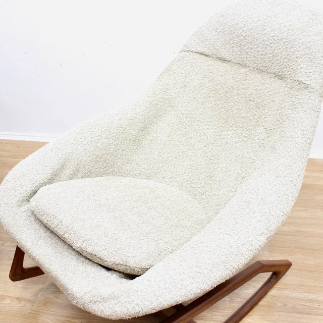 Stunning pair of mid century rocking pod chairs designed by Walter S. Chenery for Lurashell (Model - Gemini) c.1960. These...