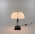Spicchio table lamp designed by Danilo and Corrado Aroldi and manufactured by Stilnovo in 1972. Danilo and Corrado Aroldi...