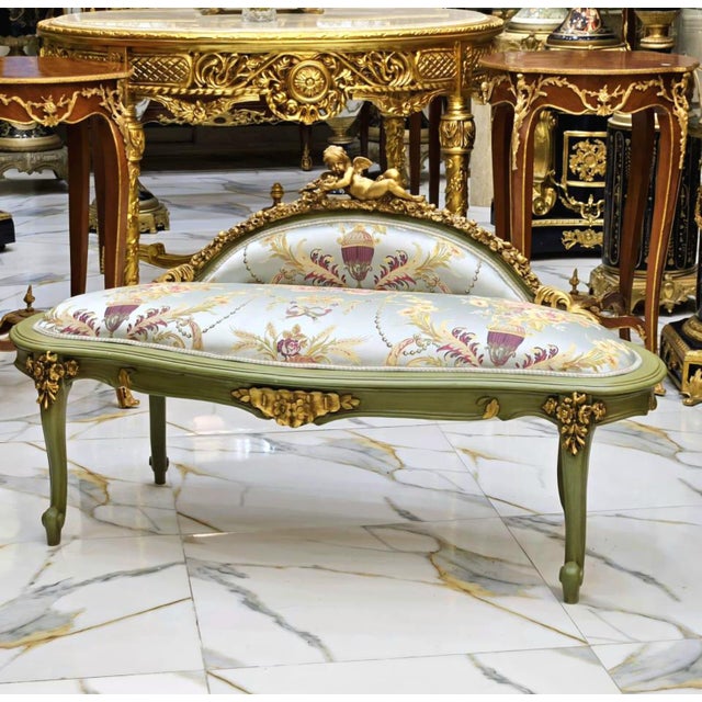This exquisite antique French-style settee is a timeless statement piece, perfect for elegant interiors. Upholstered in...