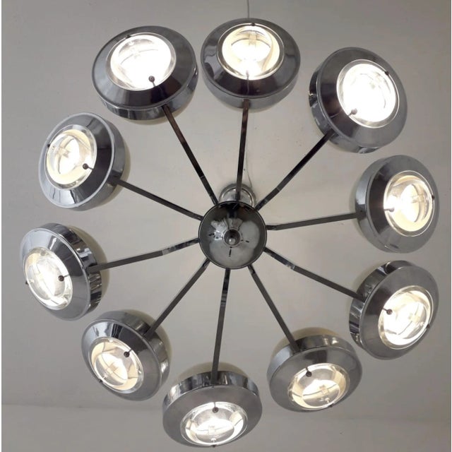 Original Italian chandelier of 10 chrome arms with glass lens diffusers and enameled metal shades by Torlasco / Made in...