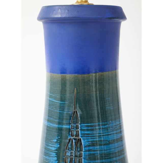 1960's Aldo Londi designed for Bitossi cityscape pottery and brass table lamp, newly rewired with some wear and patina to...