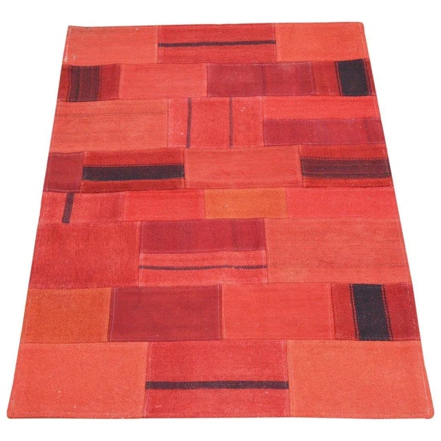 Vintage Turkish patchwork rug with natural colors, contemporary style and soft texture.