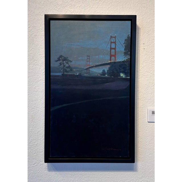 Light Thread captures a serene evening scene featuring the iconic silhouette of a bridge against a twilight sky. The deep...