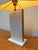 Elegant sculptural table lamp designed by Belgian designer Camille Breesch, featuring a refined minimalist composition...
