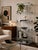 A striking 1970s Mid-Century Modern five-tier étagère inspired by the iconic designs of Charles Hollis Jones. Featuring a...